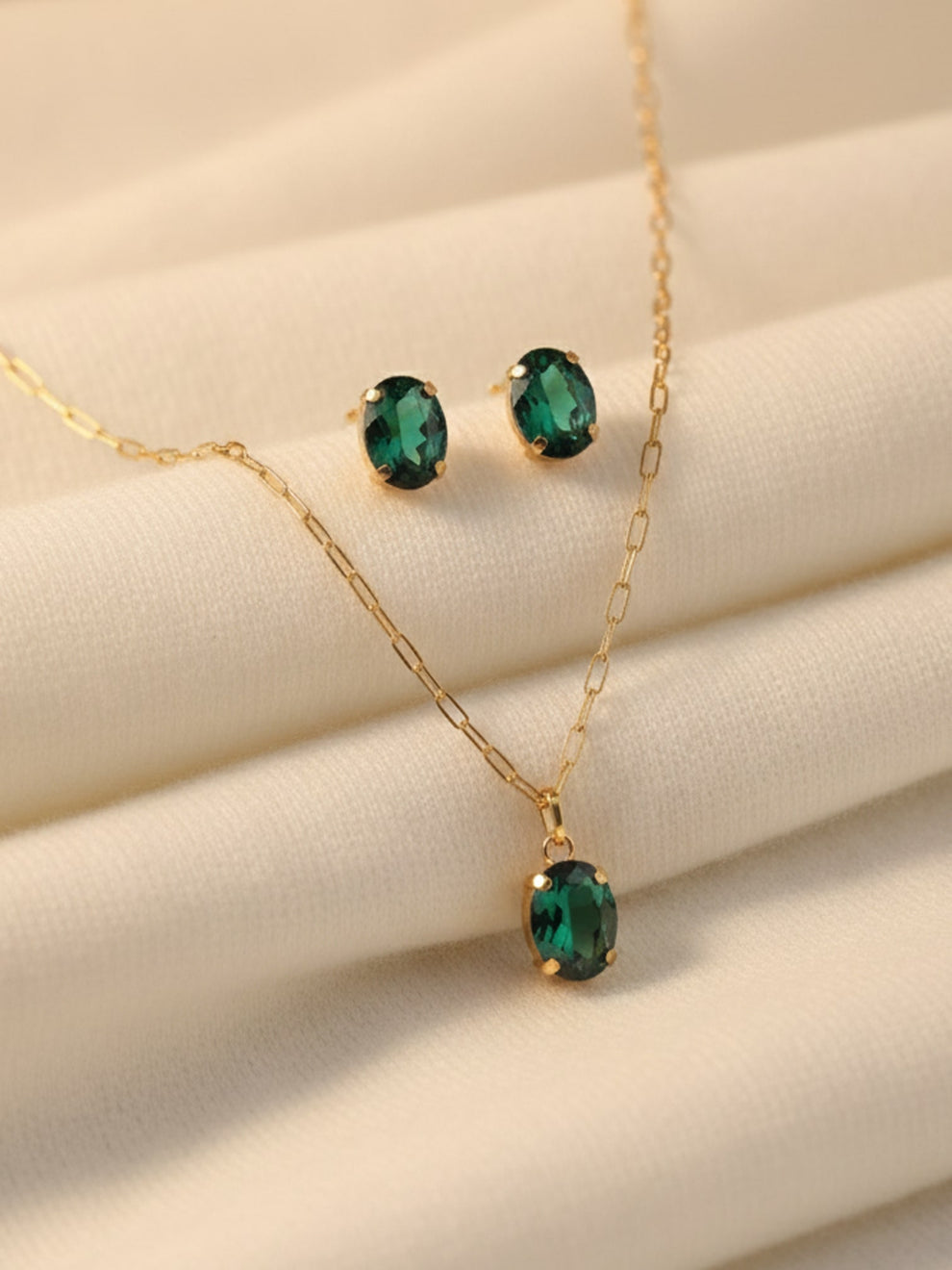 Emerald Green Oval Solitaire Set