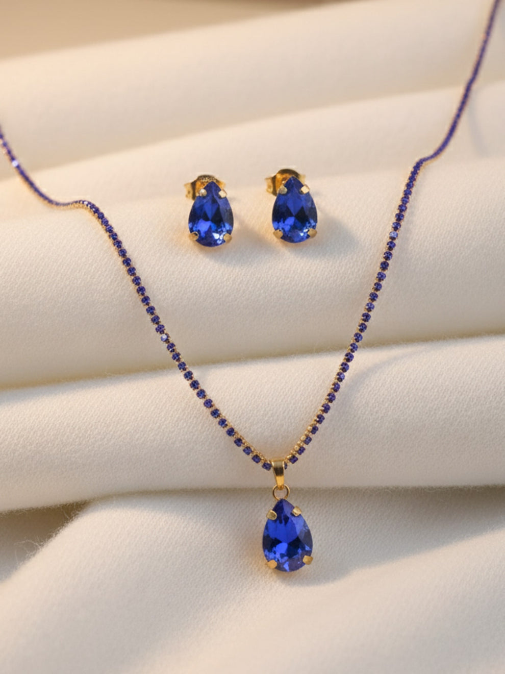 Sapphire Blue Teardrop Solitaire Set